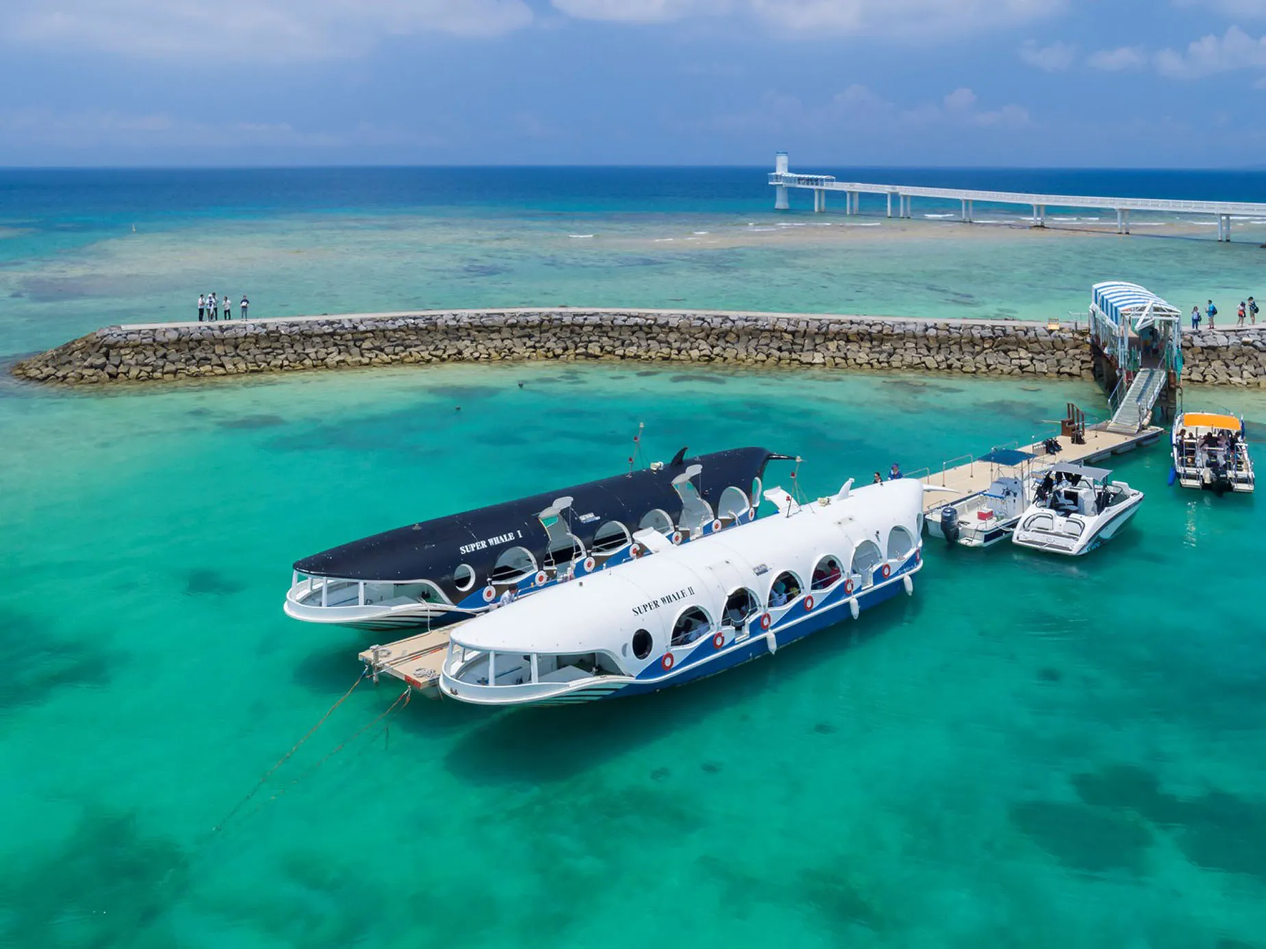 boats at a pier at busena marine park